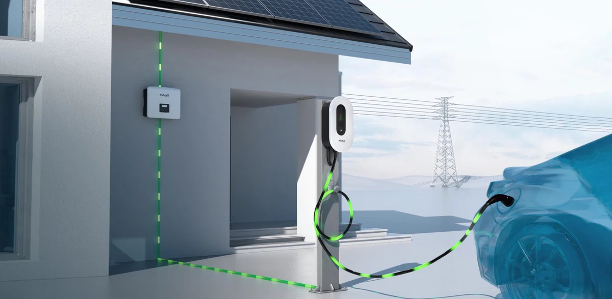 Illustration of rooftop solar panels, an inverter and an EV charger supplying an electric car.
